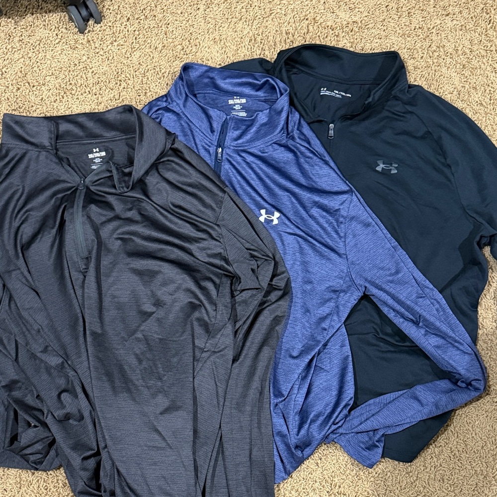 Three Under Armour Black and Blue Quarter-Zip Tops